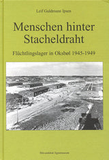Menschen hinter Stacheldraht