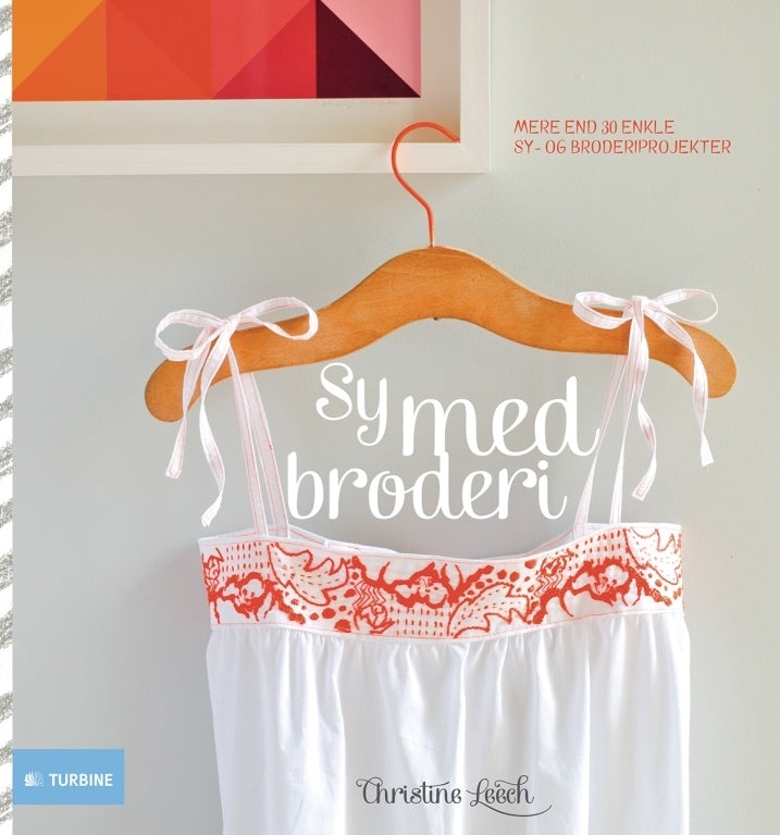 Sy med broderi