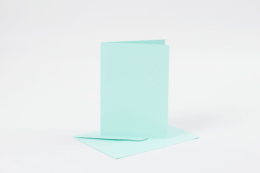 KORT OG KUVERTER KORT 10,5X15 CM LYS BLÅ 6SÆT