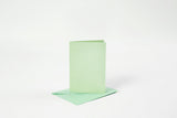 KORT OG KUVERTER KORT 10,5X15 CM LYS GRØN PERLEMOR 4SÆT
