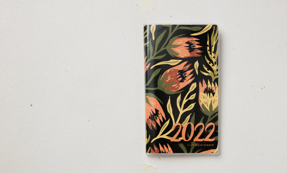 Månedskalender 2022 blomst/grene i orange/grønne farver