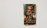 Månedskalender 2022 blomst/grene i orange/grønne farver