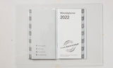 Månedskalender 2022 blomst/grene i orange/grønne farver