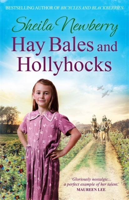 HAY BALES AND HOLLYHOCKS
